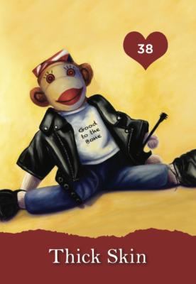 Sock Monkey with leather jacket and guitar